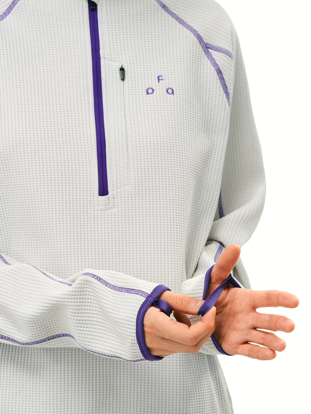 FPA UPF 50+ quick-dry half-zip long-sleeve top in Oatmeal, cuff zip texture detail